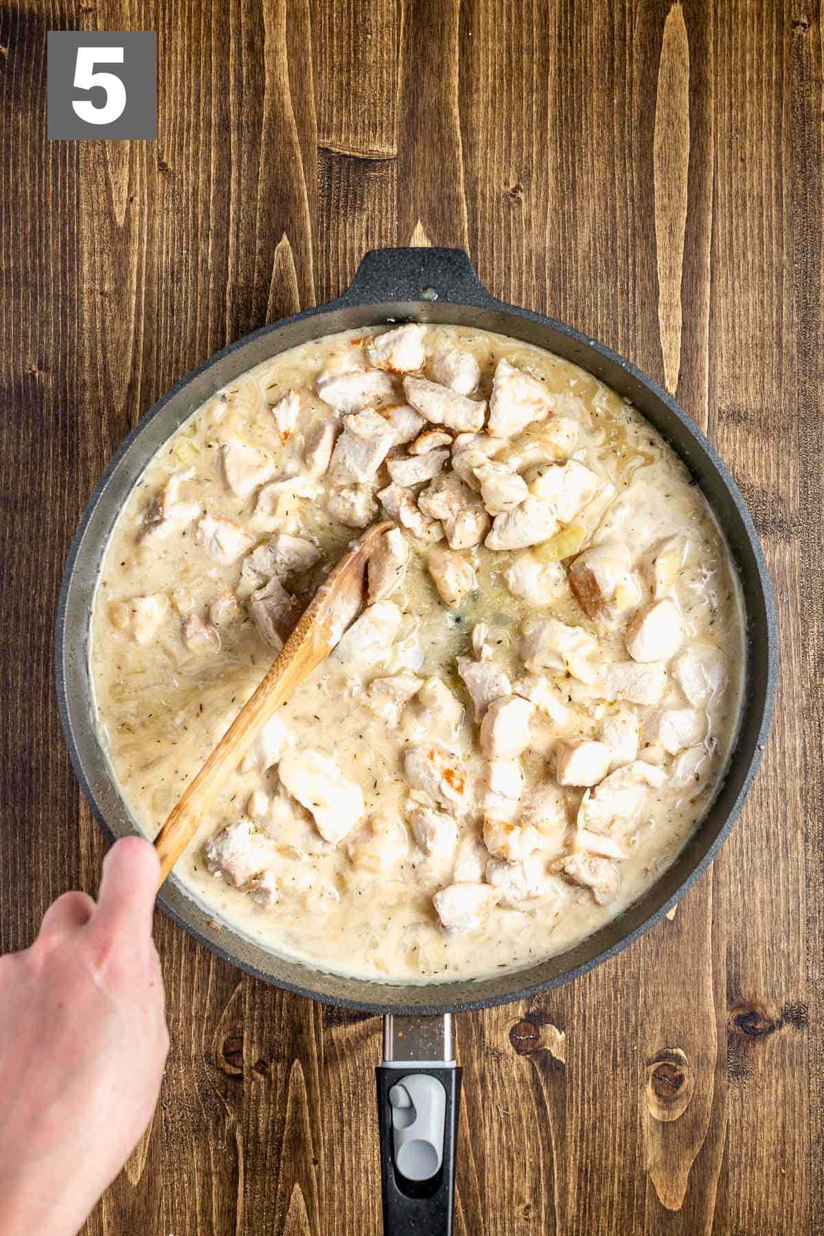 add the cooked chicken back to the sauce