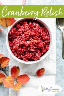 cranberry relish in a white bowl with orange leaves on the table