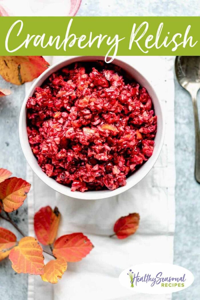 cranberry relish in a white bowl with orange leaves on the table