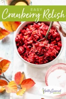 cranberry relish in a white bowl with orange leaves on the table