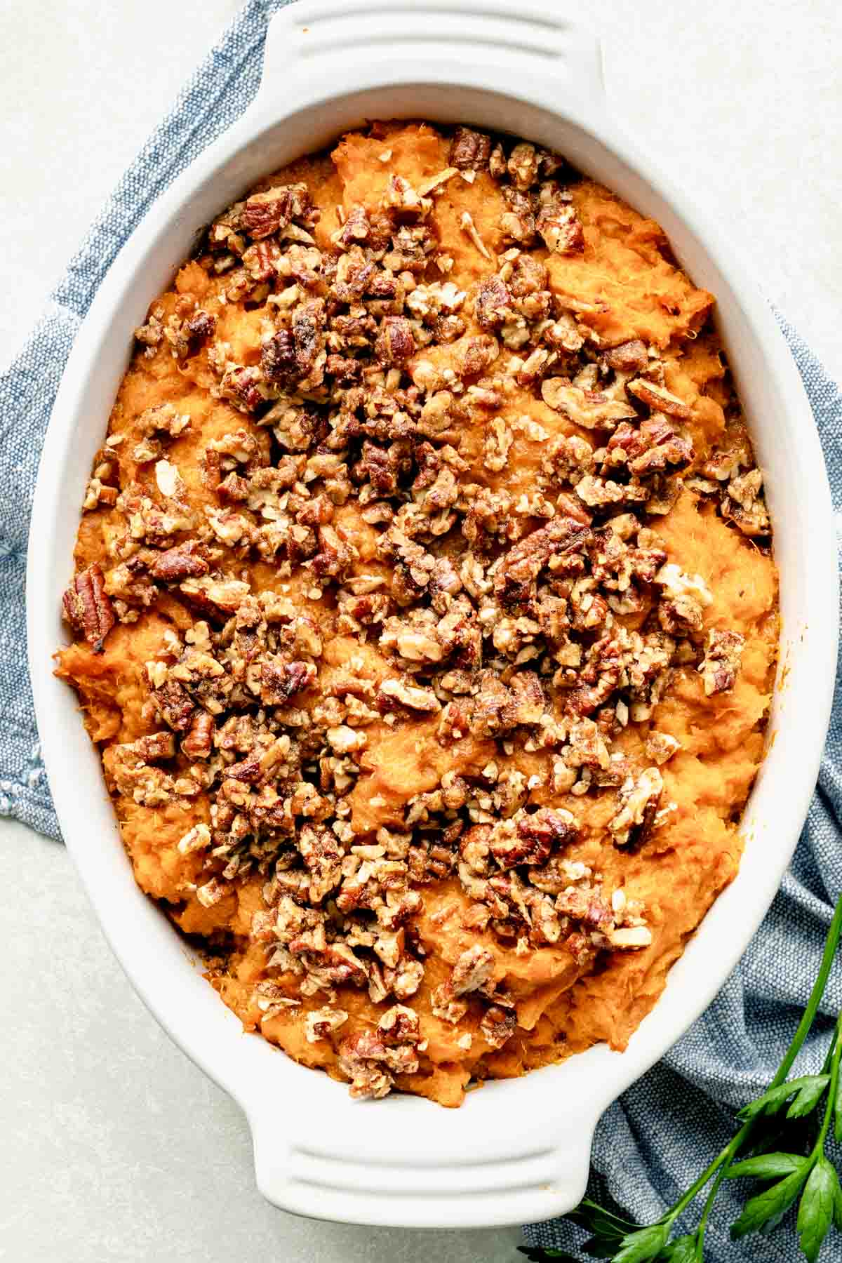 Sweet Potato Casserole in a white dish