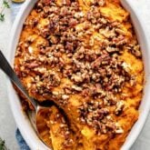 Sweet Potato Casserole in a white dish