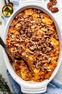 Sweet Potato Casserole in a white dish