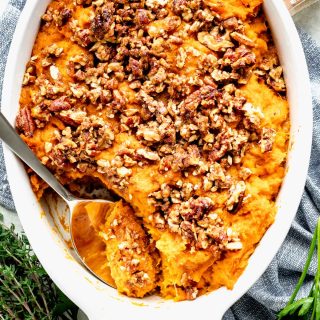 Sweet Potato Casserole in a white dish