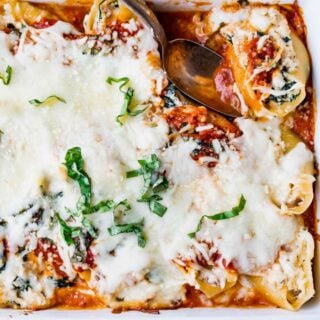 close up photo of healthy stuffed shells with spinach
