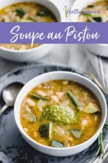 close up of soup with pesto