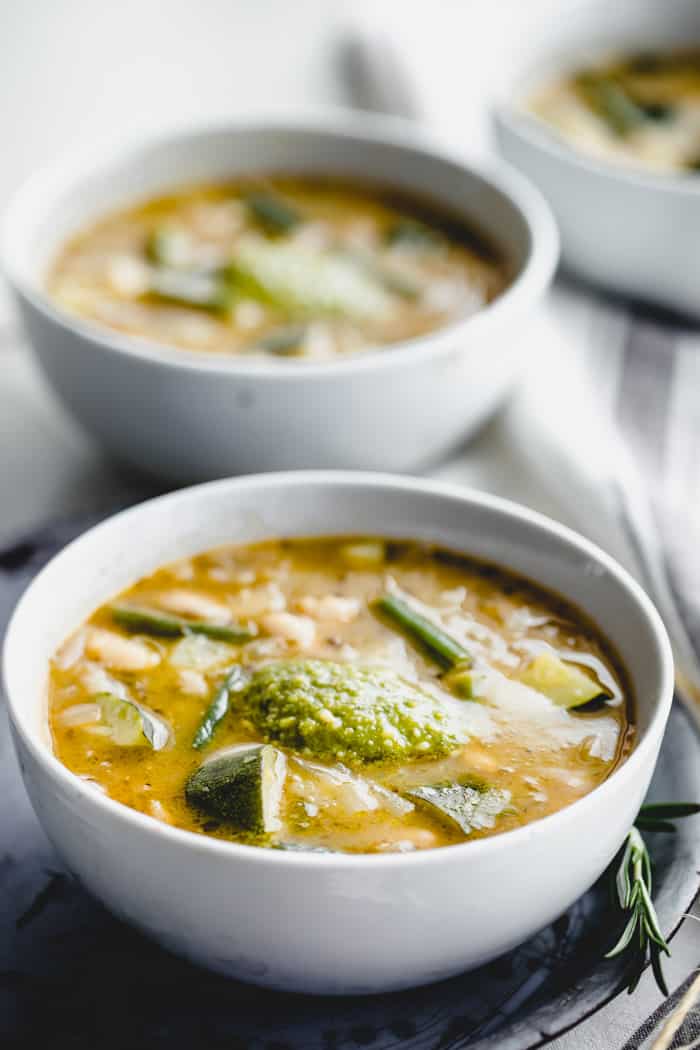 a side view of two bowls of soup