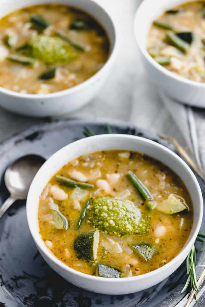 Soupe au pistou in a white bowl up close