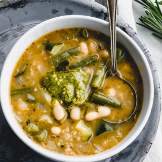 a close up of a bowl of soupe au pistou from overhead