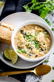 creamy white chicken chili with a chunk of cornbread