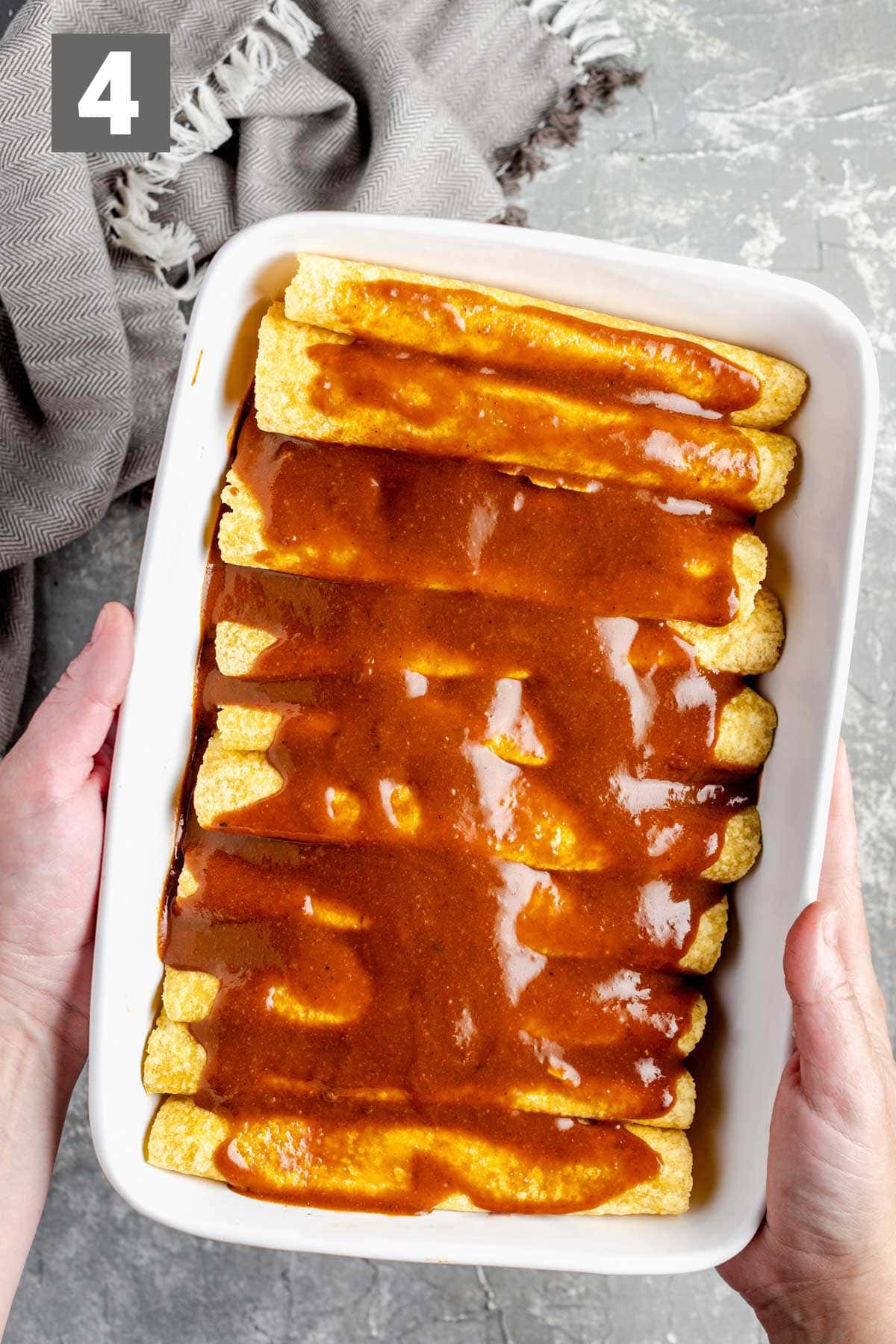 the enchiladas with sauce on them before they are baked