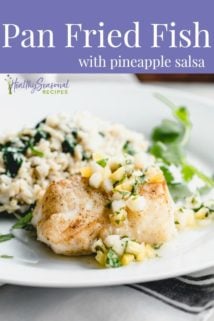 pan fried fish on a white plate with text overlay