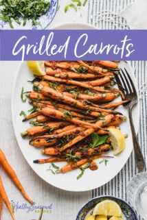 Carrots on a platter with lemon and mint