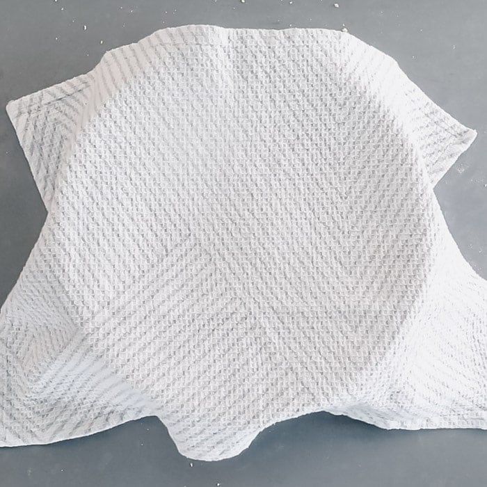 Cover with a clean tea towel and let rise