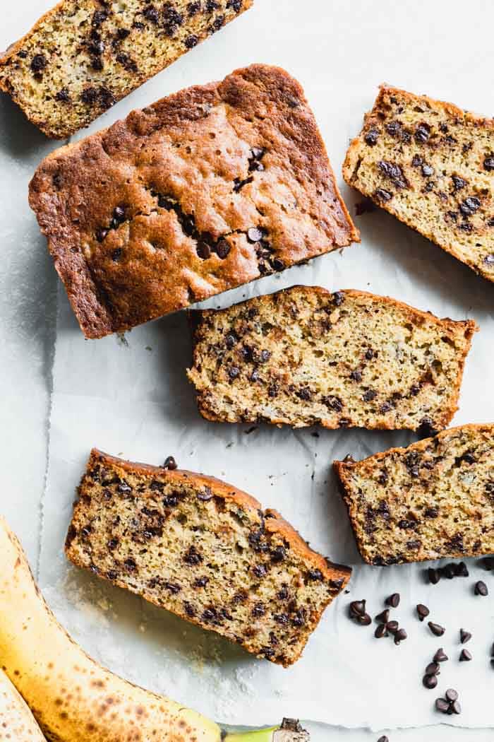 Chocolate chip banana bread slices and part of a loaf from overhead