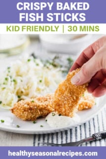 a fish stick getting dipped into tartar