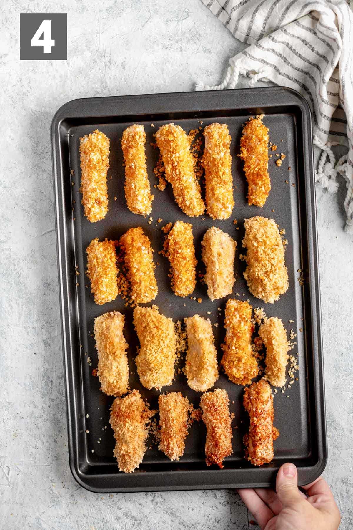 the fish sticks before they are baked