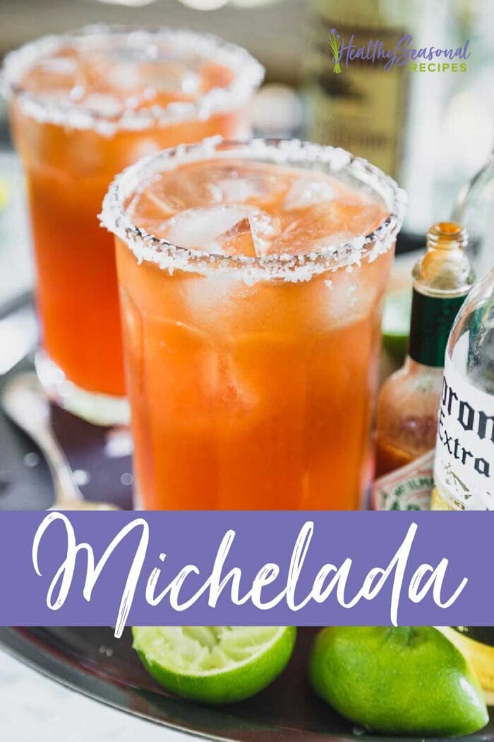 michelada in two glasses with a salted rim