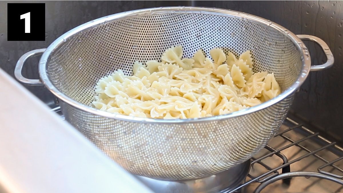 the pasta in a colander