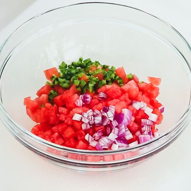 watermelon with jalapeno and onion in a bowl