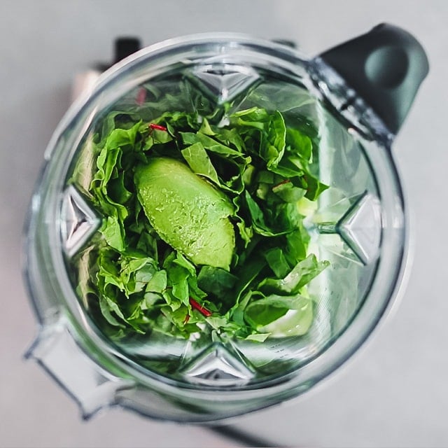 Chopped chard, avocado and pineapple added to the blender