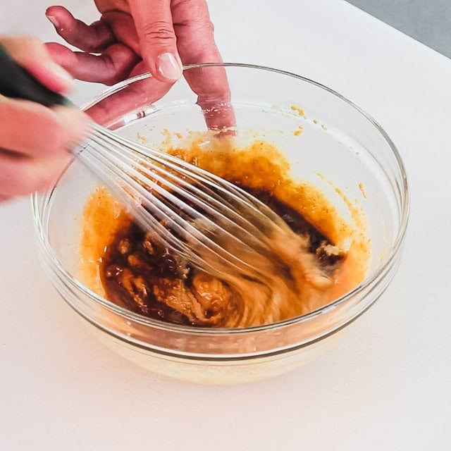 Whisk the dressing