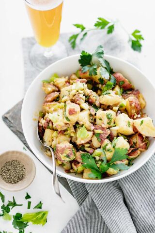 Potato Salad in a white bowl from three quarters view