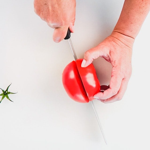cut tomatoes in half along the equator