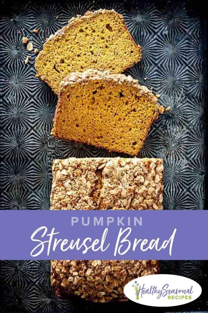 Pumpkin bread on a black cookie sheet