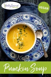 pumpkin soup in a bowl on a blue and white plate