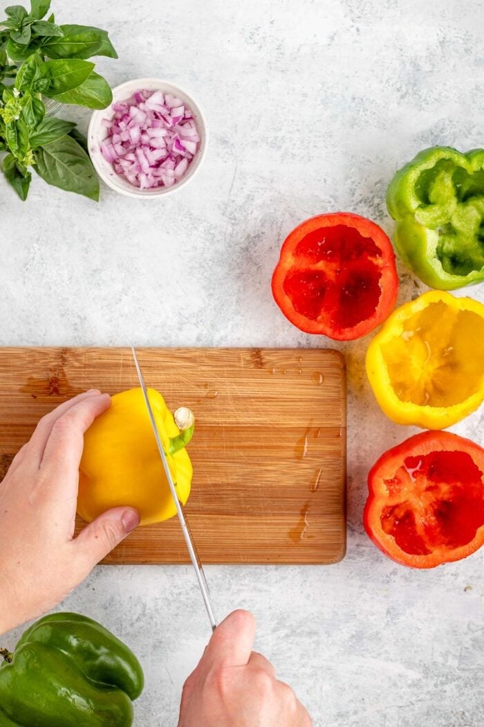 prepping bell peppers for stuffed peppers
