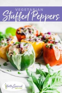 Cheesy stuffed peppers of many colors on a white platter