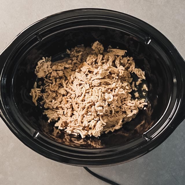 Cooked ground turkey in a slow cooker