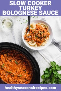 a crockpot of bolognese with a serving over pasta in a white bowl