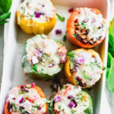 Italian Stuffed peppers in a casserole dish from overhead