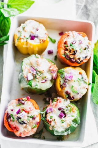 Italian Stuffed peppers in a casserole dish from overhead