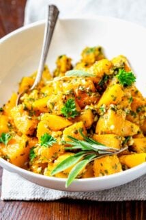 cubes of butternut squash in a white bowl