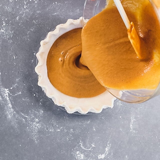 Pour the pie filling into the crust