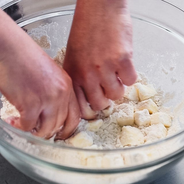 Add cold butter and work into the flour mixture.