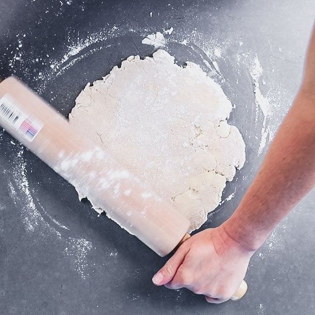 rolling out the dough into a circle