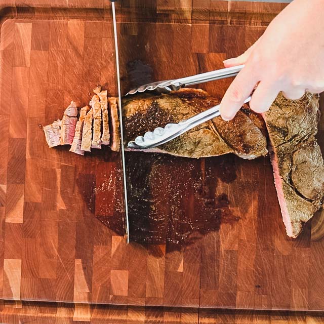 Cut the steak in half lengthwise. Cut the halves into thin strips.