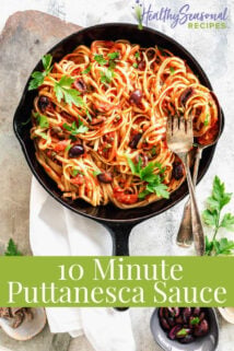 a cast iron skillet with linguini in it from overhead with text overlay