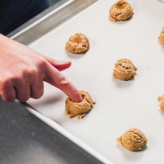 portion dough and then make well with finger or thumb