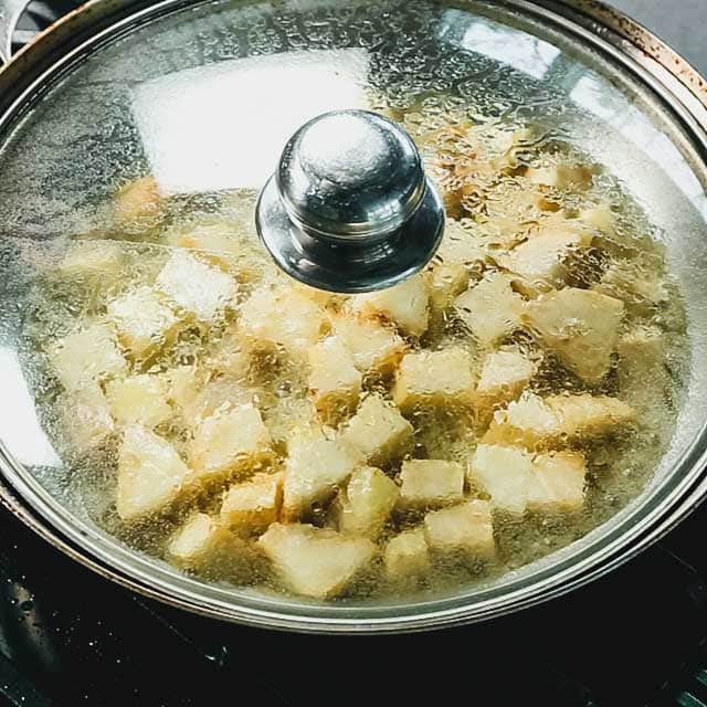The skillet with the lid on.