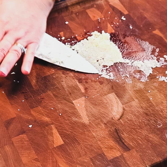 Make a paste with the garlic and salt