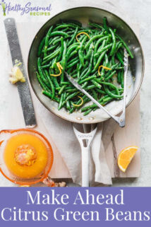 close up of green bean with orange zest on them