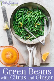 close up of green bean with orange zest on them
