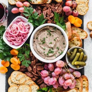 Vegan Charcuterie Board with grapes and pickled onions