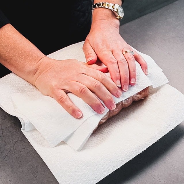Pat the pork dry with paper towels.