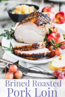 pork loin roast on a white platter with text overlay from side angle